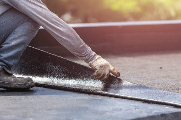 Professional Basement Waterproofing technician working in Dunlap, IL